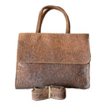 Rectangular Embossed Leather Bag with a Stylish Flap