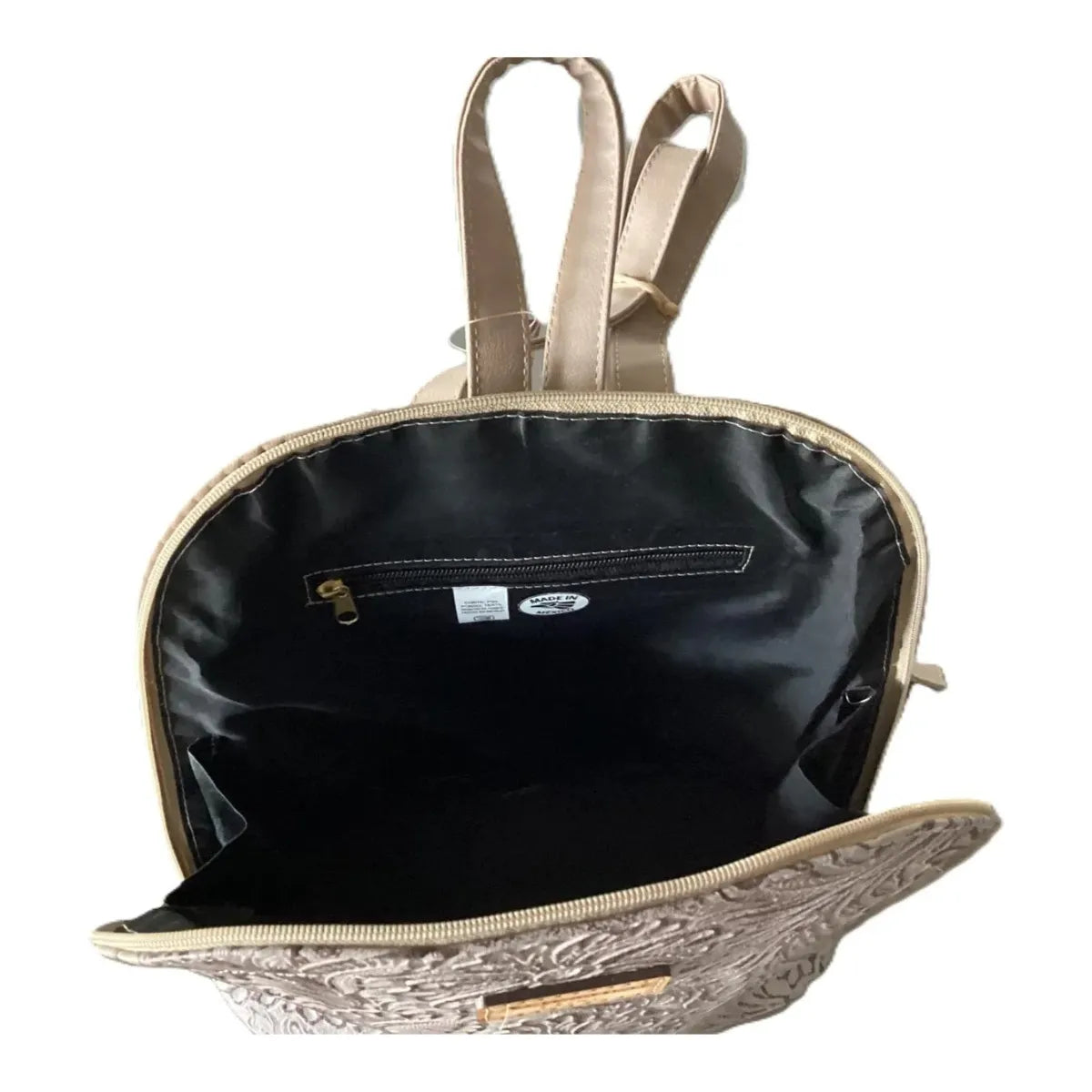 "Globo" Leather Backpack with Hand-Carved Details