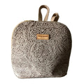 "Globo" Leather Backpack with Hand-Carved Details