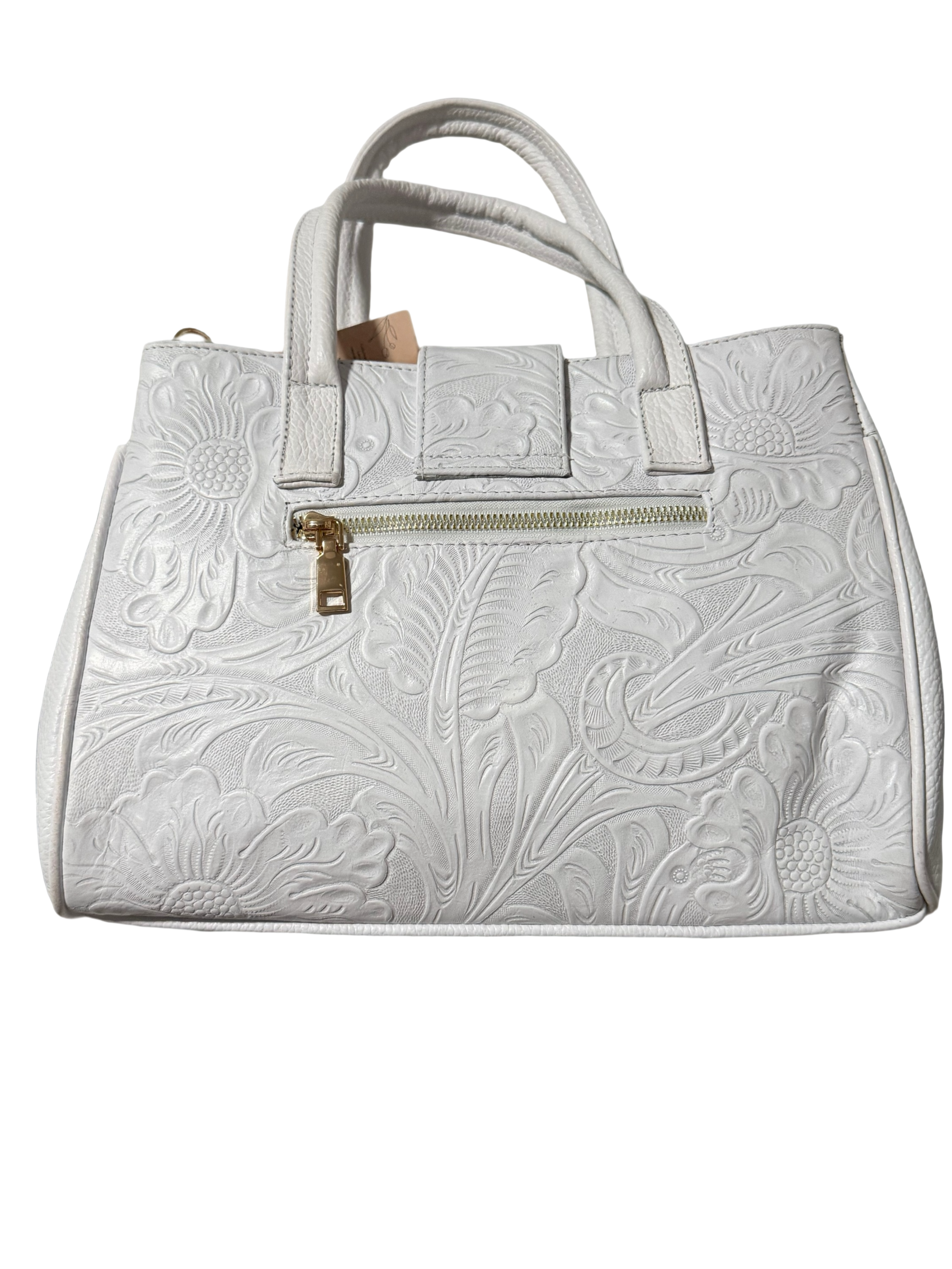 This white handbag is a leather piece featuring an intricate floral embossed design and a polished gold-tone clasp.