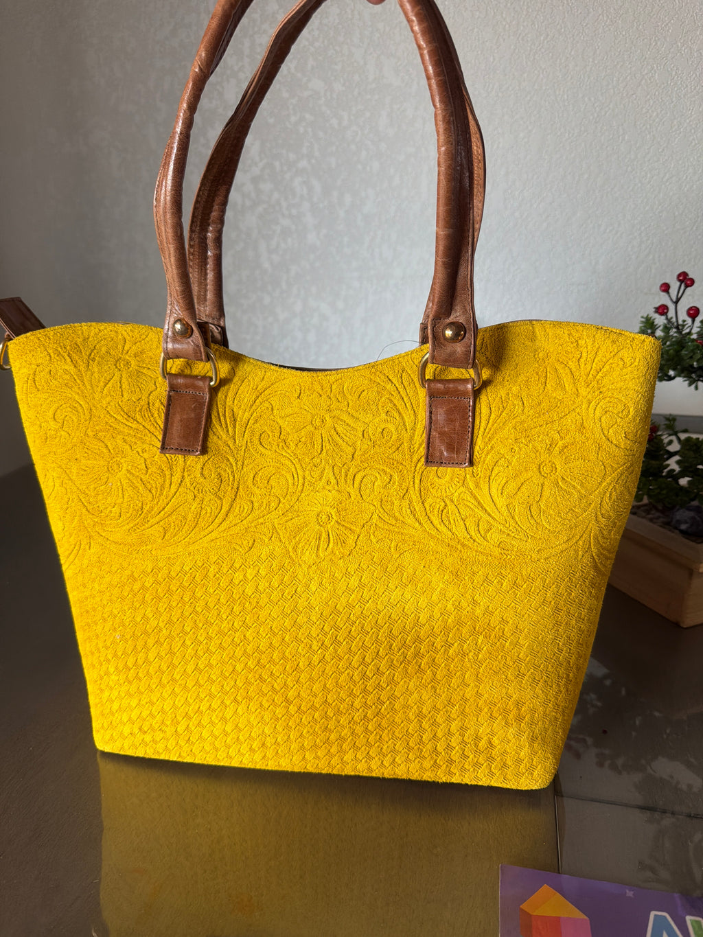 Tote the leather