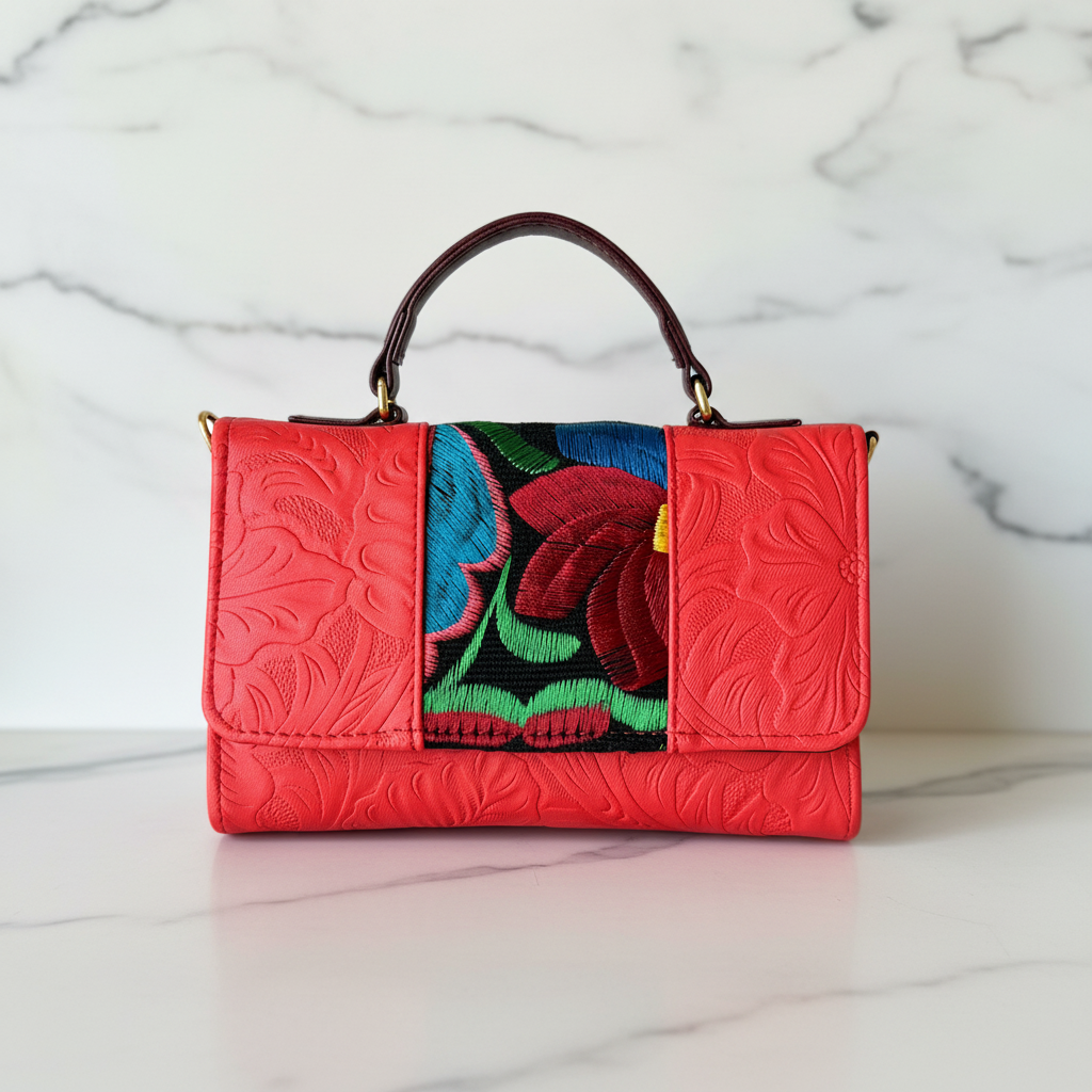 Bolsa roja frente con mármol