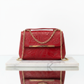 Bolsa roja - frente mármol