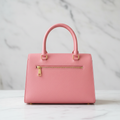 Rosalía — Pink Quilted Handbag with Tassel | Bolsa de Mano Rosa con Flap Acolchado