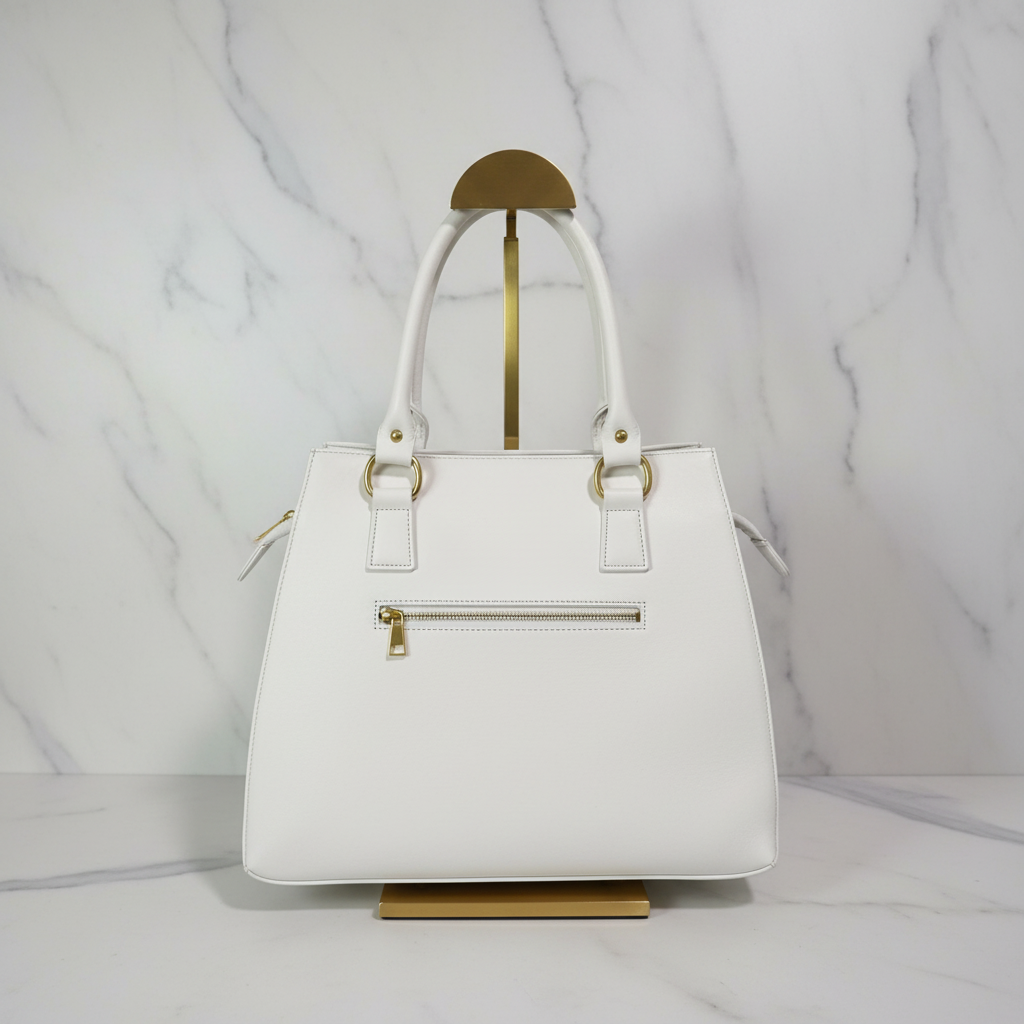 Luna — White & Gold Hand-Tooled Leather Handbag with Tassel | Bolsa de Piel Blanca con Tallado Floral